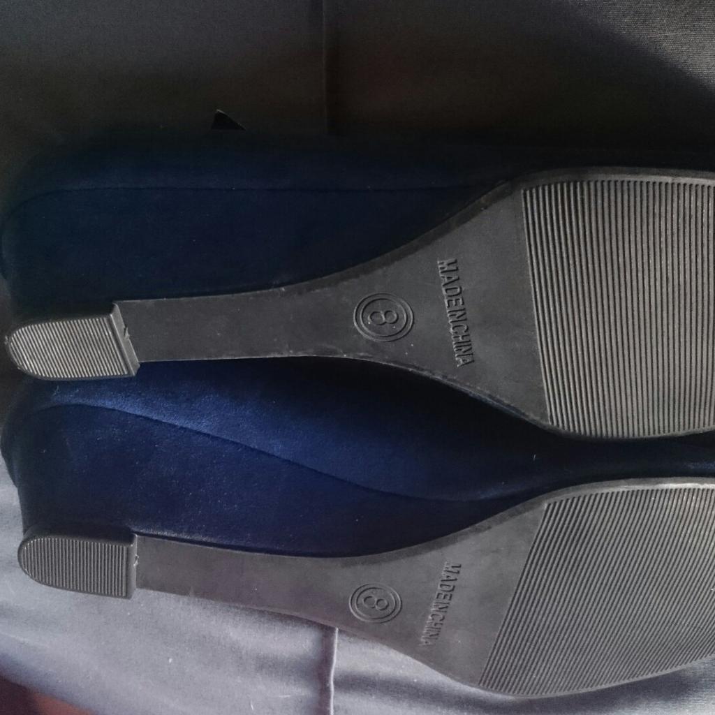new with tags would make nice gift collection only bb26dh they are wedge and suade blue cost 12 pound size8 only tryed on not worn tags are still on