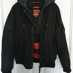 [COLLECTION ONLY]

Barely used Bomber Jacket from Superdry.

Features a detachable grey hood, one inner breast pocket, two outer hip pocket (the flaps can be hidden) and one upper arm pocket.

Size XL, but a little on the smaller side.