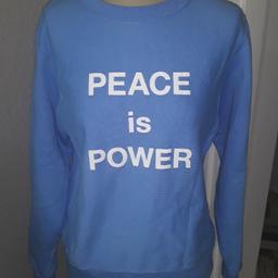 champion pullover peace is power in eine neuwertigen Zustand