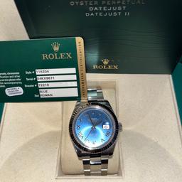 Rolex date just 2, 41mm, azzuro blue dial with Roman numerals. White gold fluted bezel, box and papers 2014