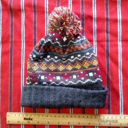 BHS Small winter hat.
100% acrylic wool weave.
Colourful pattern to stand out from the usual bland crowd.

Local collection preferred or can be posted out at extra costs.