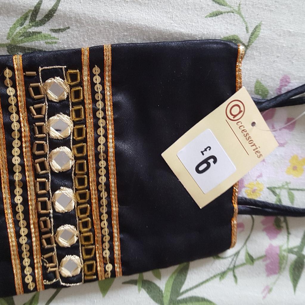 Stunning brand new with tags small satin evening bag with beading and mirror sequins. This has the most gorgeous eye-catching gold satin lining and closes with a magnetic gold clasp. Purchased from Accessorize and just had it in a drawer. Happy to post