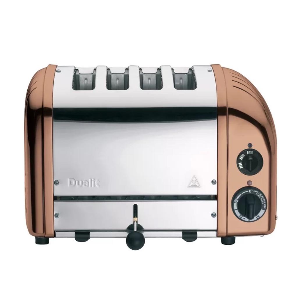 Features

The toaster is hand-assembled from start to finish.
Fully repairable or replaceable parts for a toaster that will last a lifetime.
Exclusive pro heat elements have a protective armor-plated layer covering the filament making them virtually unbreakable.
Each toaster is hand-assembled from start to finish
Item is assembled
This Vario 4-slice classic utility toaster is handmade in the UK, each by one skilled craftsman from start to finish. Quality and attention to detail are paramount and each toaster carries the assembler’s name on the base plate.

Dualit prioritises innovation, assuring their kitchen and home appliances are safe, high quality and fit for any kitchen.

Wide and Deep Slot, Ideal for Toasties

The Dualit Classic Toasters come with 28mm extra-wide toasting slots, making them ideal for making toast or warming your crumpets. Toastie cage, and warming rack available (Sold separately).