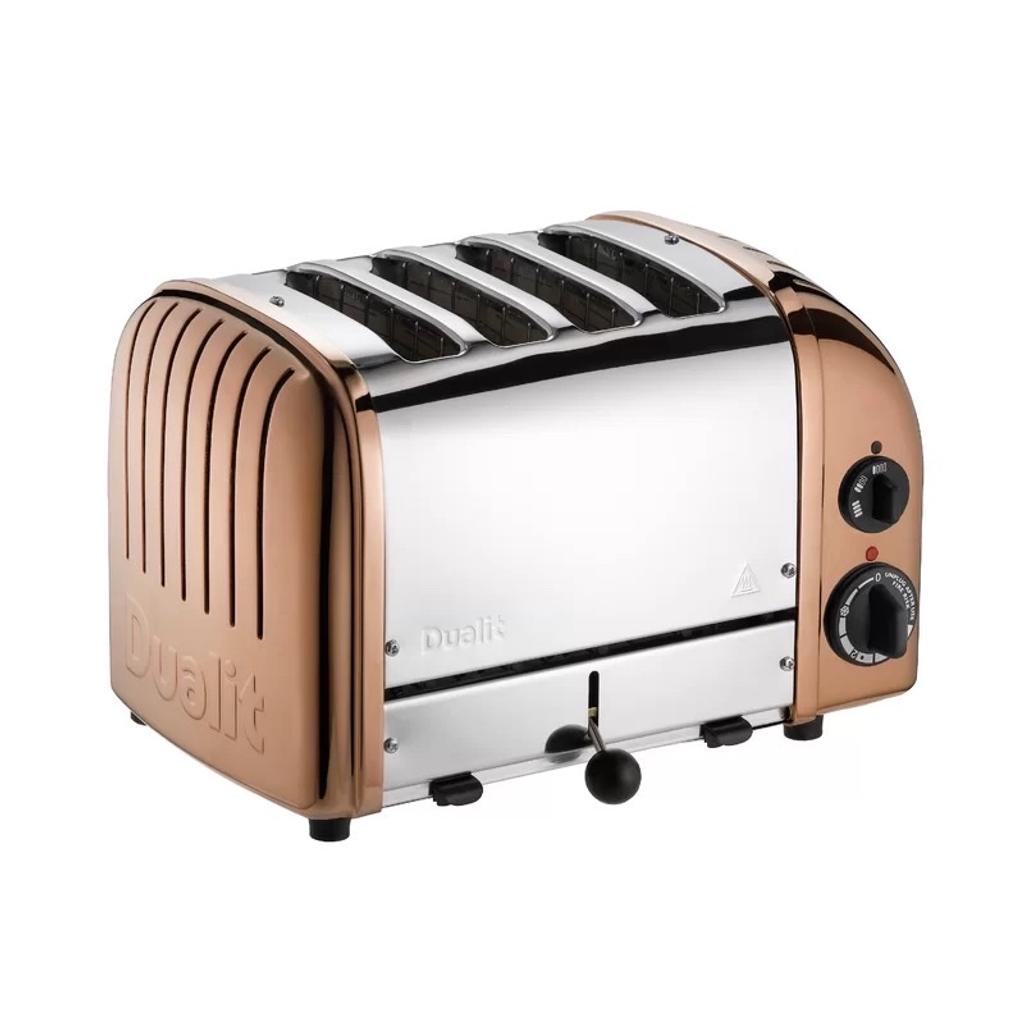 Features

The toaster is hand-assembled from start to finish.
Fully repairable or replaceable parts for a toaster that will last a lifetime.
Exclusive pro heat elements have a protective armor-plated layer covering the filament making them virtually unbreakable.
Each toaster is hand-assembled from start to finish
Item is assembled
This Vario 4-slice classic utility toaster is handmade in the UK, each by one skilled craftsman from start to finish. Quality and attention to detail are paramount and each toaster carries the assembler’s name on the base plate.

Dualit prioritises innovation, assuring their kitchen and home appliances are safe, high quality and fit for any kitchen.

Wide and Deep Slot, Ideal for Toasties

The Dualit Classic Toasters come with 28mm extra-wide toasting slots, making them ideal for making toast or warming your crumpets. Toastie cage, and warming rack available (Sold separately).