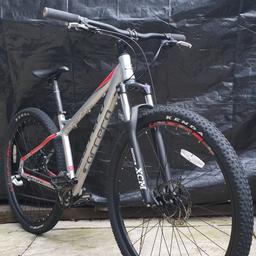 This is an Ex Display CARRERA "Hellcat" (Ltd Edition) that's currently selling for £630.

It has:
An Ultralight Alloy frame
Quick Release "Ultralite" Alloy Wheel's
24 Speed (3 x 8) "Rapid Fire" Gear's
Front & Rear "Disc" Brakes
Long Travel "ADJUSTABLE" Front Shocks
29" All Terrain "Kevlar Lined" Tyres

These are very capable bikes and are big in stature so can handle anything you throw at them.

This particular bike has also been through a FULL SERVICE, to ensure that it is as good as new and ready to go .... SO GRAB IT QUICK,?!?!?!!

* NO OFFERS THANK YOU.....