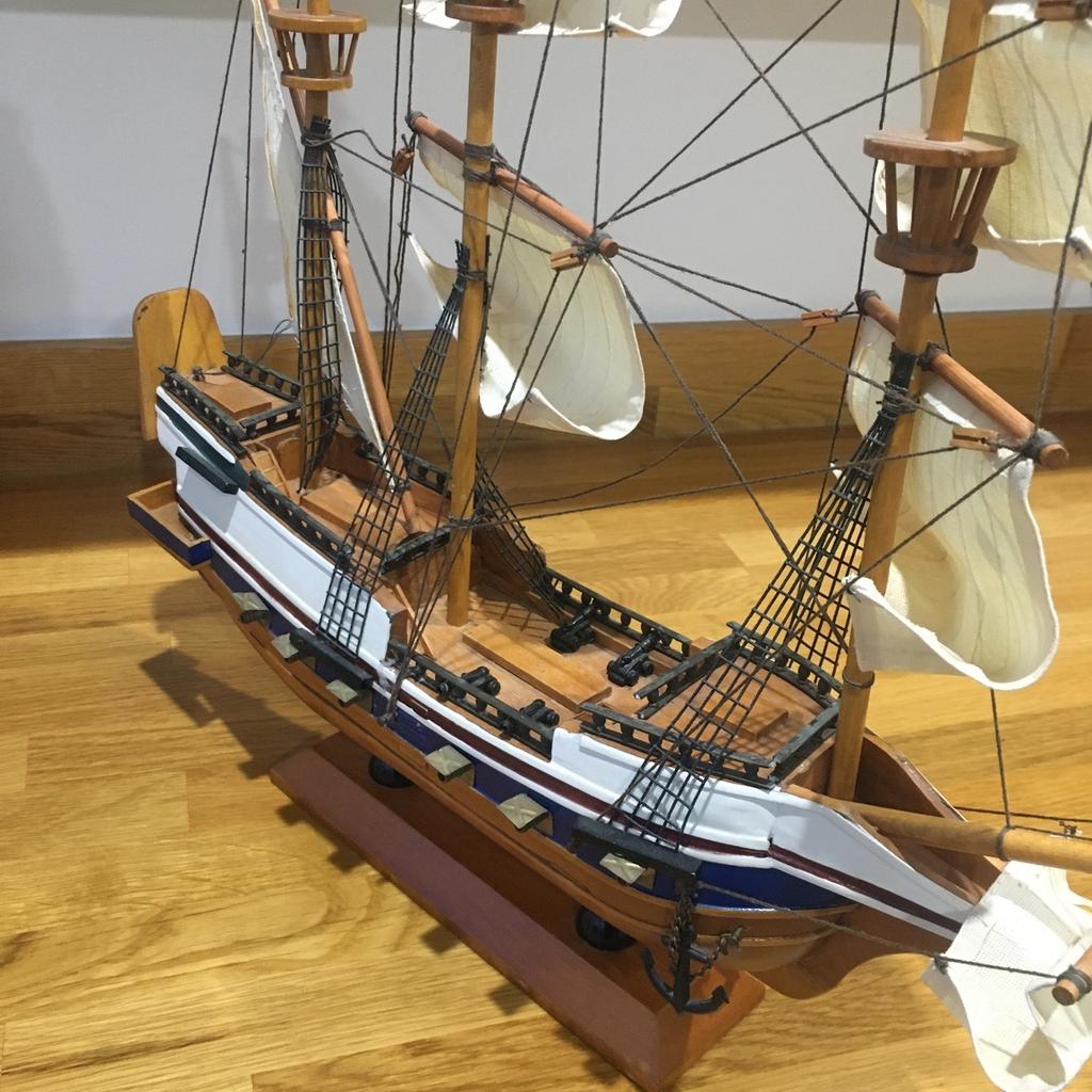 Unwanted raffle prize. Wooden model of Golden Hind ship. On a plinth so is free standing. Surface dust but otherwise perfect condition