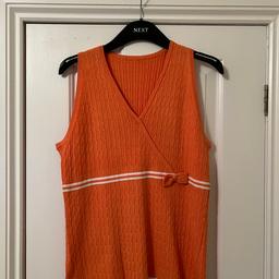 Pretty orange soft close knitt tank top.size 10. In very good condition from River island