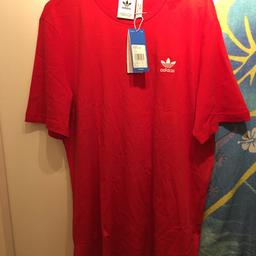 Plain red t shirt with small adidas logo

Brand new with tags
Size medium
Collection only