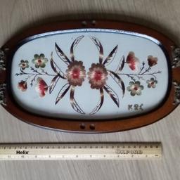 Vintage Serving Tray 

Embroidered Linen in Glass Top 

Dark Wood with Metal Detail and Handles 

Measures approx 17 inches in length and 10.5 inches in width 