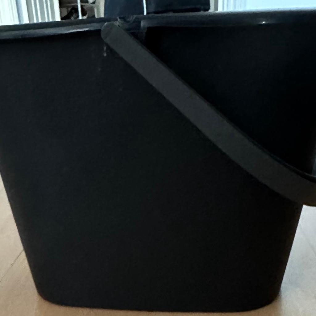 Black bucket ideal for washing the car etc