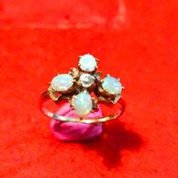 i have for sale a truly stunning 9ct gold fire opal and diamond ring size E so quite small but reflected in the price nice colour to opals, collection from darlington dl1 or can post via special delivery at buyers cost paypal accepted, low offers will be ignored  thankyou