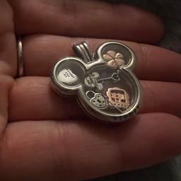 slight broken locket on back small charms available with necklace charms can be sold separately for necklace without charms £15 
Silver key £5
Disney and rose gold £20
Locked heart £5