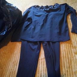 ladies black leggings and top with pearls round neck and down side of trousers