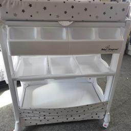 Baby change table with bath, white with grey stars. has been cleaned and put down. No missing parts.