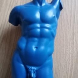 Blue man's torso on a plinth.  Heavy set resin on a wooden base.  Would make an interesting piece for the desk, man/ woman cave as will get friends & family curious.

Could be used for hanging jewelry or other items.

H40W12D12cm approx

Local collection preferred or can be posted out at extra costs.