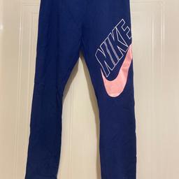 Girls blue nike leggings with a pink logo in excellent condition genuine nike originally bought from JD sports collection from ws2 beechdale area