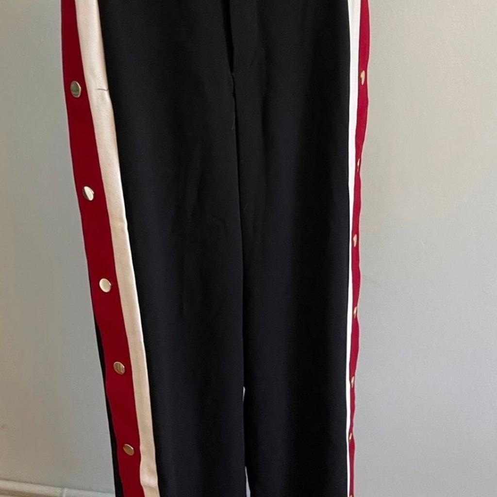 Hi and welcome to this gorgeous looking comfy ladies Zara Wide Leg Side Button Snap Track Pants Size Small in perfect condition thanks