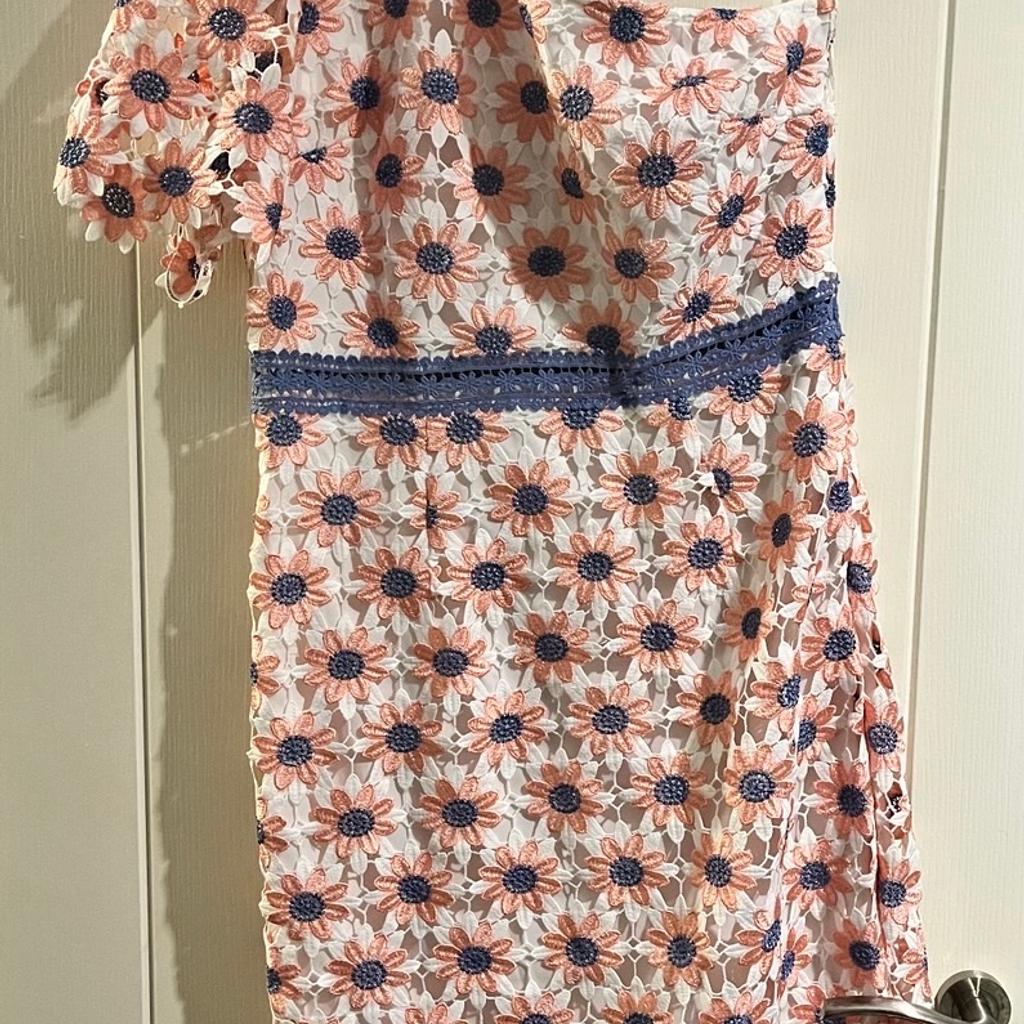 Chi Chi London one shoulder midi occasion dress. White/coral/cornflower blue floral design. Size 16, side zip and hook & eye fastening. Brand new with tags, never worn. Bought for £70, selling for £30.
