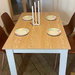 Table and 4 chairs, medium size (900mm x 1380mm). Light oak melamine top with white melamine legs. Leather look chairs with wood effect legs. Easily sits 4 adults. Plates and candle not included.

Collection CH43 Oxton/Bidston or I can deliver on the Wirral for a contribution to my fuel.