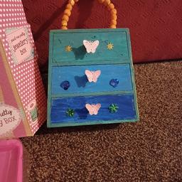 Olivia & Patch jewellery box. my daughter decided to paint and decorate the jewellery box only. it's still got some bits inside not been used. free to anyone .