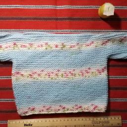 Hand knitted baby woolen top #1

Newly made suitable for newborn. Lovely horizontal bands of floral pattern coloured pattern.

Local collection preferred or can be posted out at extra costs. Within mainland UK, £2.95, elsewhere please enquire & do my best to let you know as soon as possible.