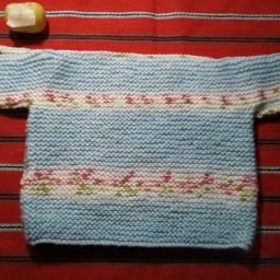 Hand knitted baby woolen top #3

Newly made suitable for newborn. Lovely horizontal bands of floral pattern coloured pattern.

Local collection preferred or can be posted out at extra costs. Within mainland UK, £2.95, elsewhere please enquire & do my best to let you know as soon as possible.
