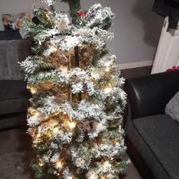 frosted pre lit Christmas tree 6 foot pop up collection only please only used a couple of times