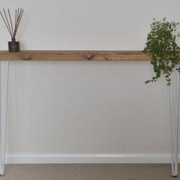 Reclaimed Treated Timber Style, Solid Wood Furniture with Medium Oak Finish Top.

L 110cm / H 75cm

Perfect for your lounge, your hallway, placed over a radiator or even in your bathroom; this stunning reclaimed timber console table with hair pin legs is perfect for any room in your home.

Handcrafted individual piece of furniture. Timber is hand cut, sanded, treated, and waxed in ‘Medium Oak’. 

Wood Top: D 19.5cm / H 4.4cm / L 110cm
Leg Length: 71cm

Total Table Height: 75cm

Paid £95