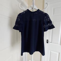 Blouse "Oasis”

 Navy Colour

New With Tags

Actual size: cm

Length: 62 cm

Length: 39 cm from armpit side

Shoulder width: 35 cm

Length sleeves: 23 cm

Volume hands: 37 cm

Breast volume: 88 cm – 90 cm

Volume waist: 90 cm – 91 cm

Volume hips: 97 cm – 98 cm

Size: 10 ( UK ) Eur 36

Main 1: 100 % Polyester

Main 2: 48 % Polyamide
 34 % Cotton
 13 % Viscose
 5 % Lyocell

 Made in China

Retail Price £ 38.00 , 49.00 € (Eur)
