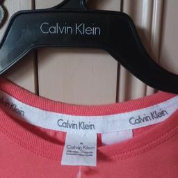 BRAND NEW TEE SHIRT FROM Calvin Klein. size med. 100% cotton.