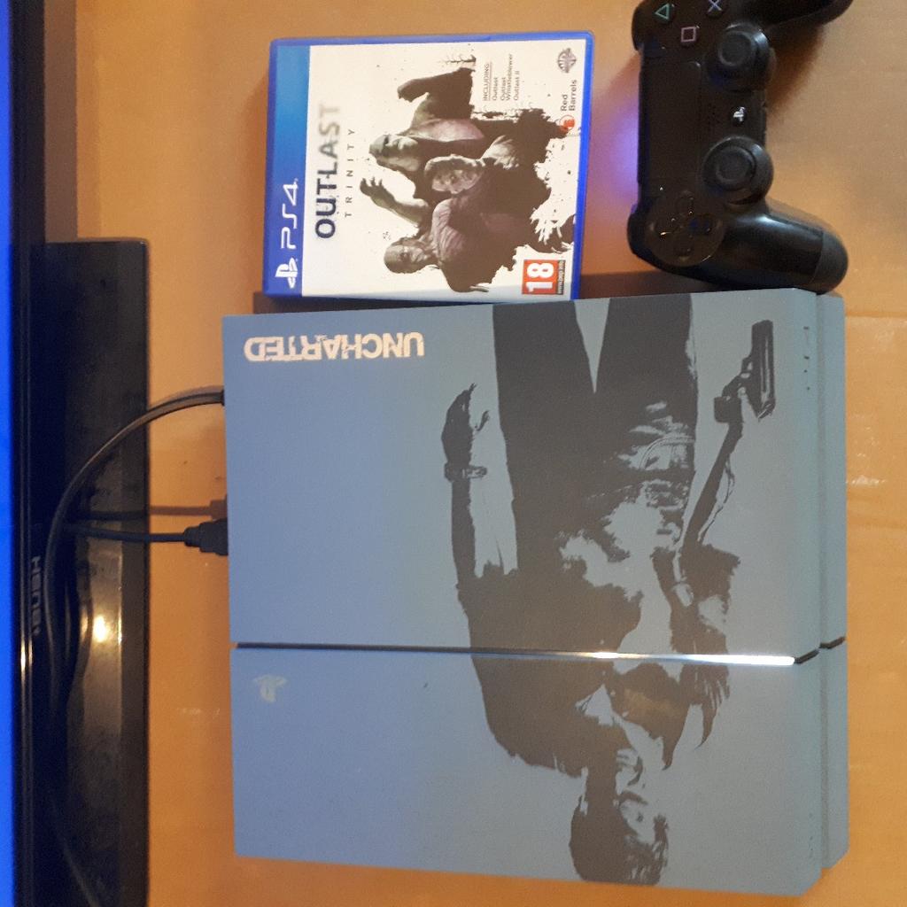 PlayStation4 Uncharted Limited Edition PS4 Console. 1 controller. 1HDMI cable. 1 power cable. 1 game out last trinity double disc. 500 gig harddrive. will be reset to factory settings. IN good working order