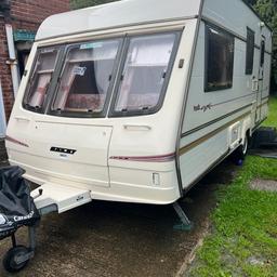 Bailey Pageant CD Moselle 1996 4 berth what a brilliant example of a old caravan just had a recent gas check a few weeks ago in great shape must see to appreciate for a old caravan lots of life left in her be sad to let go last serviced in 2021 with damp report no damp everything works on 240v as well as gas L shape lounge makes up to a large double bed bunk beds oven grill and 4 gas hobs and fridge freezer and blow air heating gas or electric water heater works of gas or electric everything works on this caravan it comes with awning with a extra compartment what sleeps 2 people full porch awning as well included water waste fresh water barrel and step and water pump and had new tyres in 2021 so they are all good come veiw and see how well this van as been looked after before offering silly money any offers will be egnored serious buyers onley please any questions please ask everything can be shown working when viewing light weight caravn Mass in Running Order weight: 915 kgs Maximum a