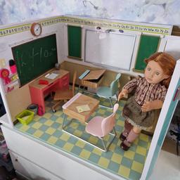 school house with teacher doll