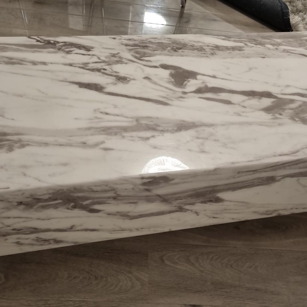 Marble coffee table. Very strong quality. Reluctant in selling but havent got space :( :(

EXTREMELY HEAVY, YOU WILL NEED 2 OR 3 PEOPLE TO CARRY THIS, I CANNOT HELP UNFORTUNATLY.

Measures:
Height: 35cm x width: 120cm x Depth: 60cm

very small damage nothing major
Collection LE5 1