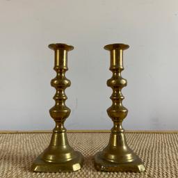 A pair of small, Antique, Solid Brass candle holders.
7” (18cm) tall