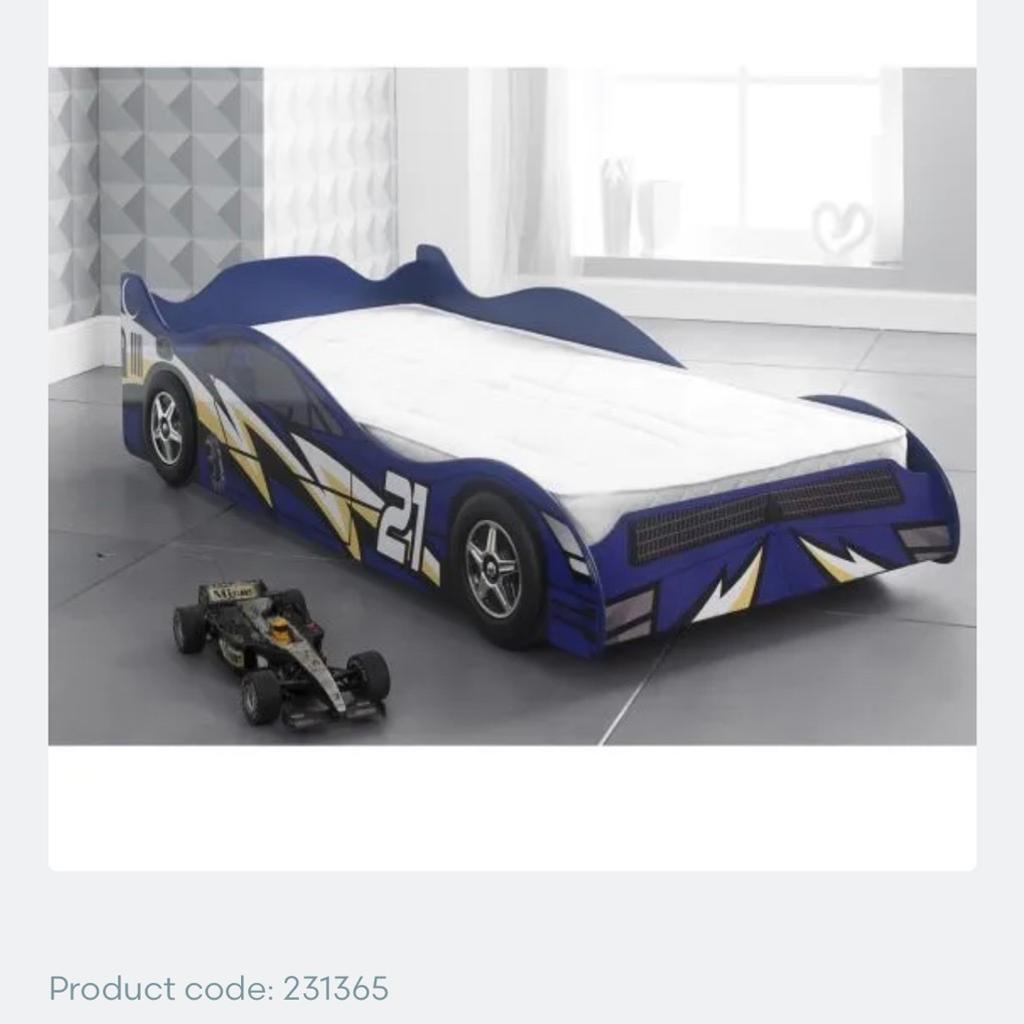 IN VERY GOOD CONDITION and only a little scratch which really can’t be seen.

A modern and well-designed No. 21 car bed, with the look of a real racing car, which was ideal for my son who loved cars!

High side rails and high back-end allowed my son to sleep safely; protection from falling off the bed during sleep.

Purchased mattress separately for £120 which was made-to-order so size of 10cm so that child can not fall.
Always used separate fitted sheet then a waterproof mattress protector underneath so there’s no soiling and the mattress is as brand new!

Sturdy – Made from tough MDF with a supportive slatted base; bed built to last.
Fun – Great for young fans of cars and racing, this bed will appeal to budding young racers.

Colour: Blue
Made of MDF wood
Graffiti numbers and letters
Takes a standard 3ft single mattress WHICH I AM SELLING WITH THE BED
Slatted base
Dimensions: H 52 x W 99.6 x L 203.5cm

Smoke free and pet free home

Cash on collection please!