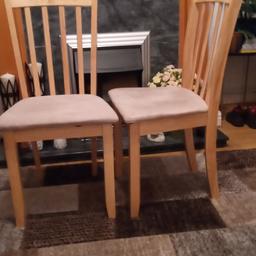 2 chairs solid light wood colour good condition. FREE
