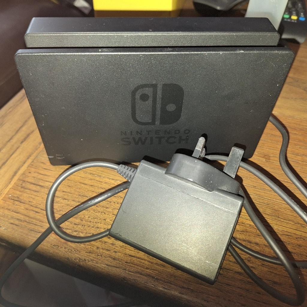 Nintendo switch dock with power supply, few small marks, working fine.