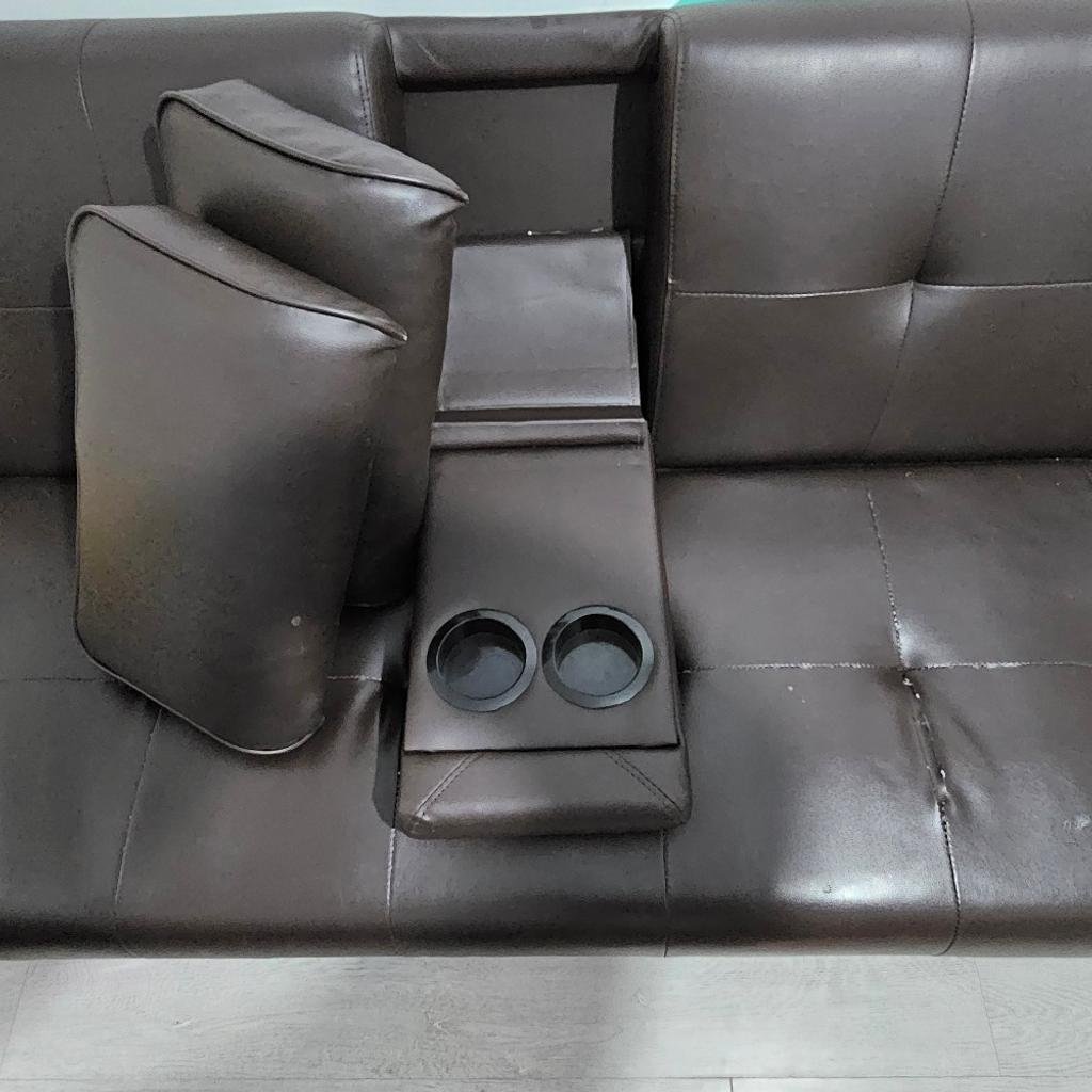The sofa bed with its 2 pillows as shown in the pictures. RRP 180. Some slight marks but nothing that a cover cannot hide.