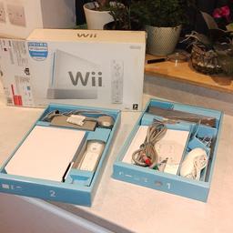 Wii console - boxed with inserts. 
In great condition, fully tested and working