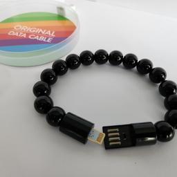 Brand new. Available in black & pink. Iphone lightning charging cable 21cm length. Unique bracelet funky style. Perfect for emergencies. Can post within UK. Collection from Luton LU4