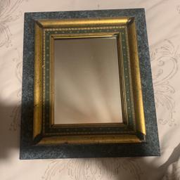Green and Gold vintage wall mirror 
Measurements- 28cm * 32cm
Buyer to collect
£5 o.n.o