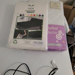 Brand new white sheet and a Brand new mattress protector ( single size )selling together for £5.00
