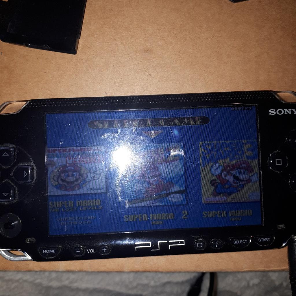 PSP with power cable with one. memory card adapter with Games on in working order.. bad parts will need a battery thumb rubber missing eject button missing but easy to open will play disc 1 pixal out but when game's are on you can't notice it