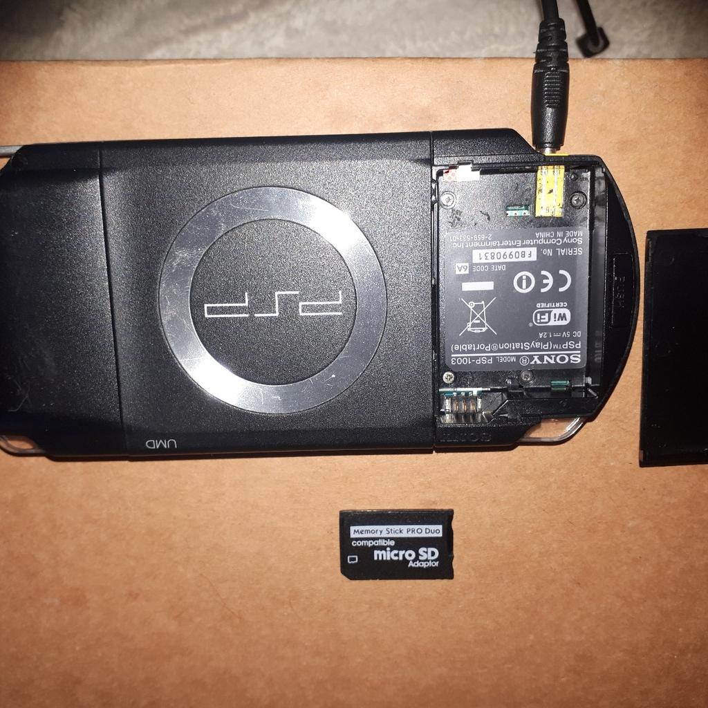 PSP with power cable with one. memory card adapter with Games on in working order.. bad parts will need a battery thumb rubber missing eject button missing but easy to open will play disc 1 pixal out but when game's are on you can't notice it