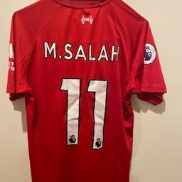 Liverpool 
Mo Salah t-shirt 
Very good condition, no tears 
Size xs / age 11 onwards