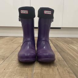 Hunter Wellies including Hunter Welly Socks. 
Purple
Size UK5, US 6M/7F, EU 38
Mid calf
Wide leg
Adjustable buckle on sides
Wide fit
Round toe
Used, in fair condition - slight colour fading

Inside writing reads: 
Original gloss W23616
UK 5, US 6M/7F, EU 38
Hunter Boot Ltd
FX0912

I am a size 4 in Next and M&S footwear, size 4.7, US 7 in Nike trainers. These boots fit me perfectly when worn with Hunter welly socks. 

Collection from Sutton Coldfield. Will consider posting for £5 P+P