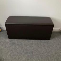 Brown faux leather ottoman/storage truck with padded seat top so doubles up as seat very heavy and sturdy 
Great storage toys / duvets/  clothes or in hall way for shoes as you can sit on it 
Pet and smoke free house 
Collection Kettering