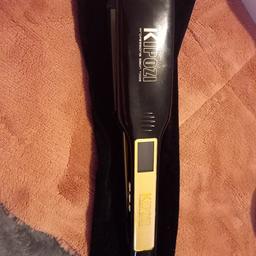 excellent condition, used once.Wide plate heats up well, comes in bag. free remington curler.Grab a bargin