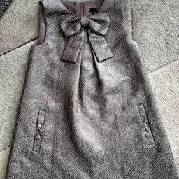 from a smoke free clean home 
fully lined silver sparkly dress with 2 pockets